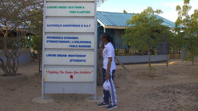 Sr. Mbuli at the initiatives signpost