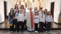 Iryna Nazarenko (second from the left in the back row) with students from the “Vsesvit” Lyceum after Holy Mass