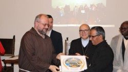 Br. Prodip Gomes recieving the award