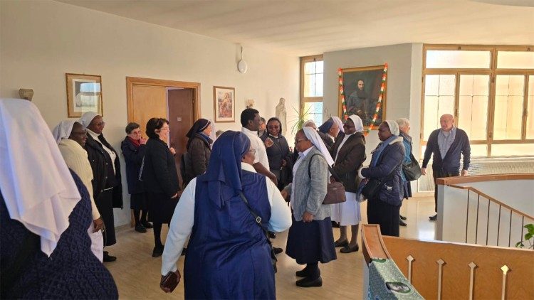 A meeting of SMA Fathers and OLA Sisters